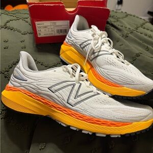 New Balance White Running Sneakers with Yellow & Orange Midsole